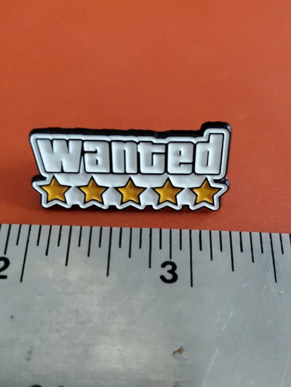 Grand Theft Auto Wanted Enamel Pin — White and Gold Stars